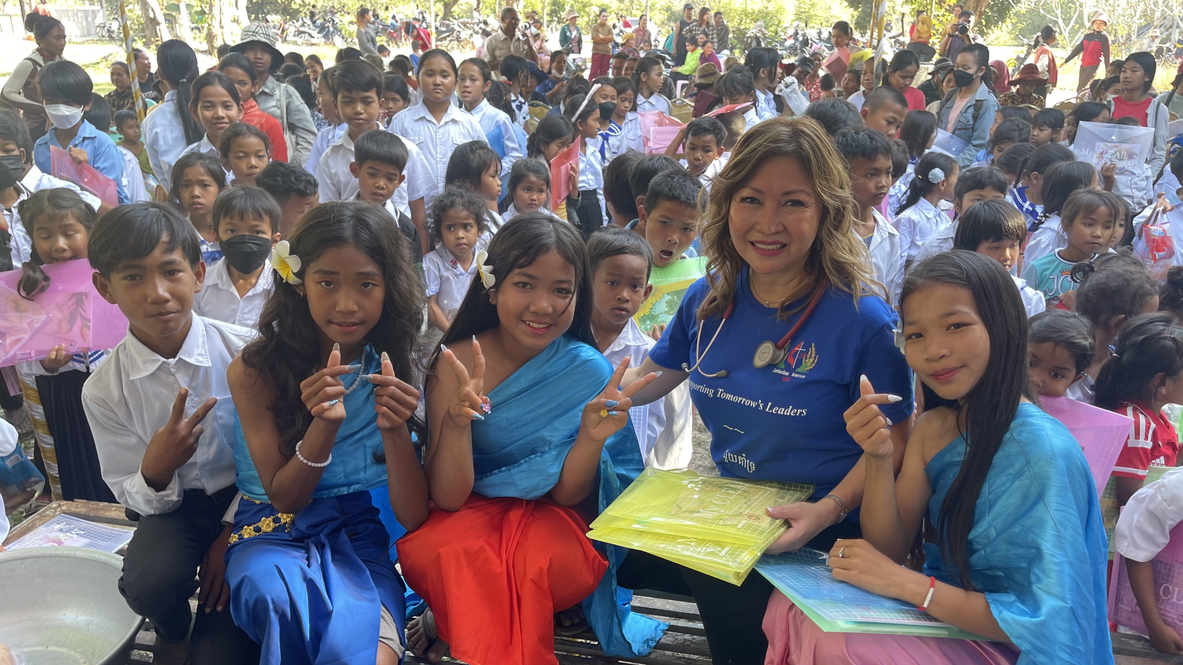 Dr. Lee (second from the right), pastor of Long Beach Cambodian American UMC, on a medical mission trip at a church orphanage in Cambodia. Photo courtesy of Dr. Lee, 2023.