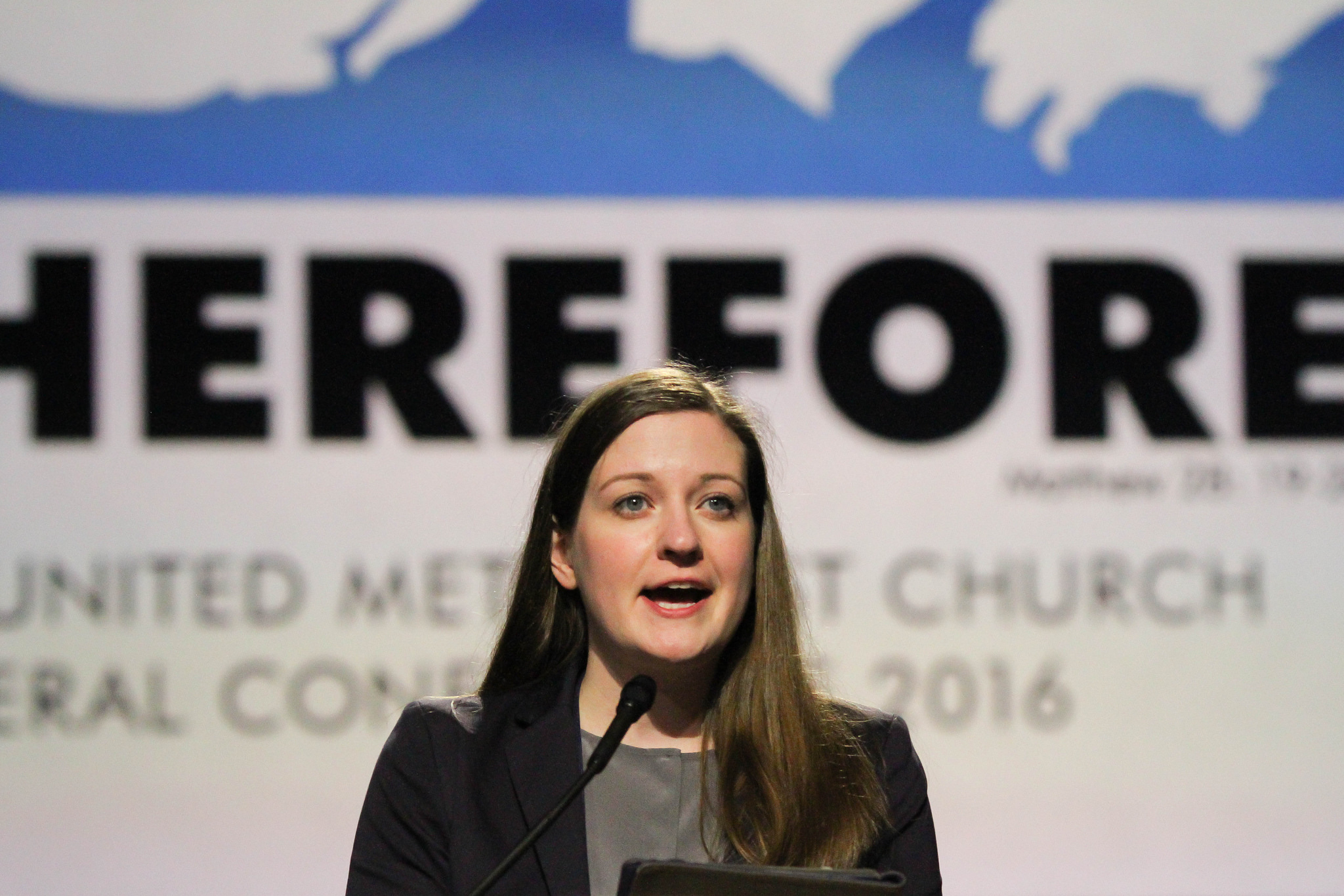 Marie Kuch-Stanovsky presents the report recommending divestment from fossil fuel companies. Photo by Maile Bradfield, United Methodist News Service. 