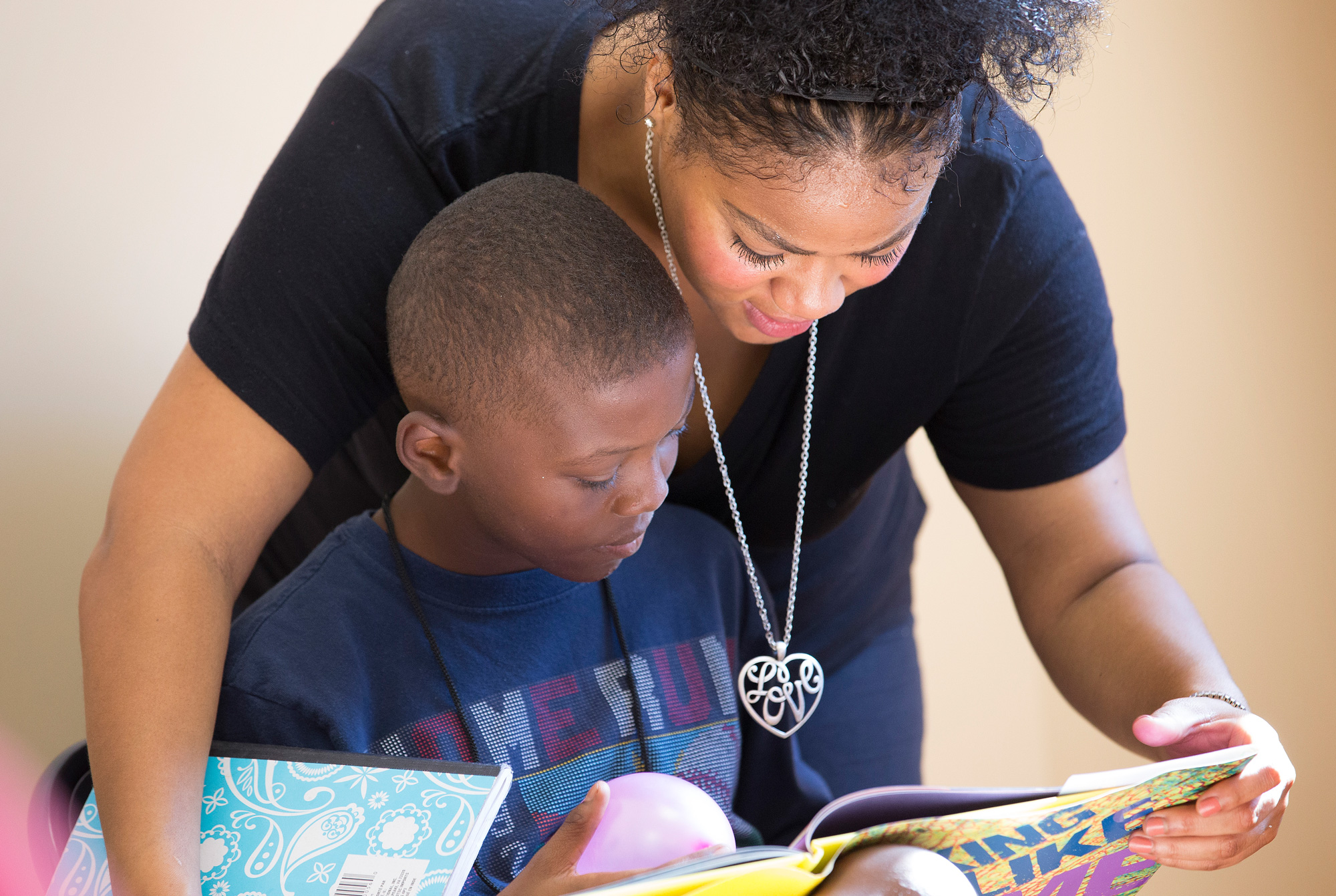 Servant-Leader Intern Deidre Thornton, an active student and member of the Wesley Foundation at Tenn. State University, helps student Jonathan learn a new word at the Freedom School at Gordon Memorial United Methodist Church in Nashville, Tenn. College students are trained by the Children's Defense Fund to serve as instructors for students in grades K-12 in Freedom Schools across the nation. Photo by Mike DuBose, UMNS.