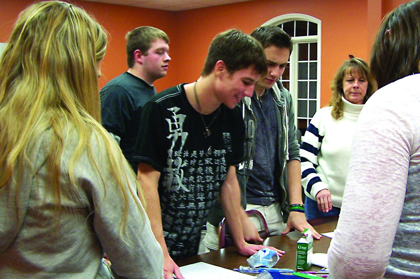 Members of Benton First United Methodist Church 150 boxes and bags of health kit supplies. Photo by Sue Engle. Courtesy of UMNS.