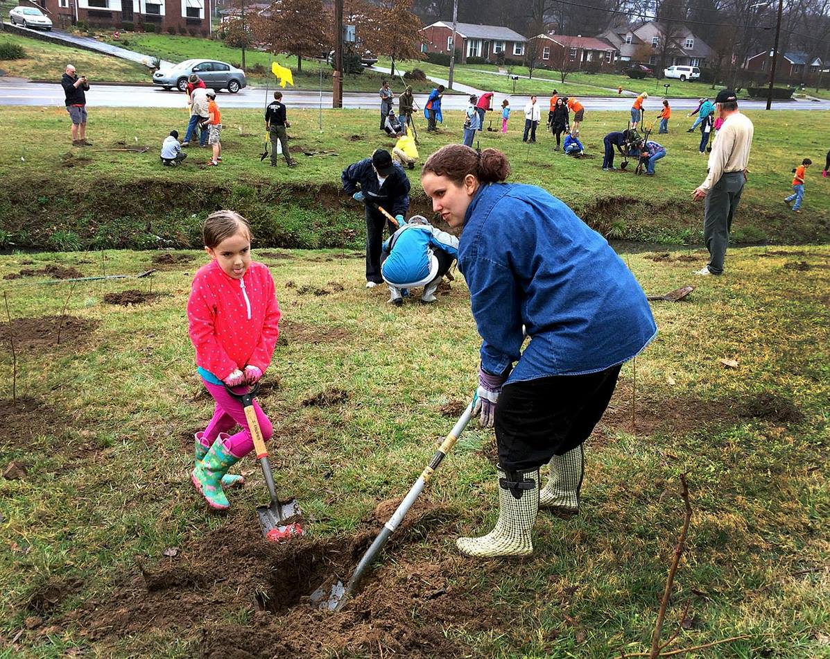Cadence Cobb (left) and her mother, Megan Cobb, dig at Hillcrest United Methodist Church, Nashville, Tenn. Photo by Kathryn Spry.