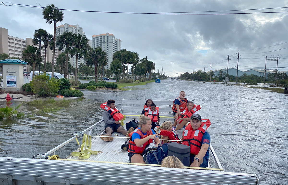 A Coast Guard Sector Ohio Valley Shallow Water Response Team rescues nine people and one dog Sept. 16, 2020, near Navarre Beach, Fla., after they were stranded by Hurricane Sally. U.S. Coast Guard photo courtesy of Sector Ohio Valley Shallow Water Response Team.