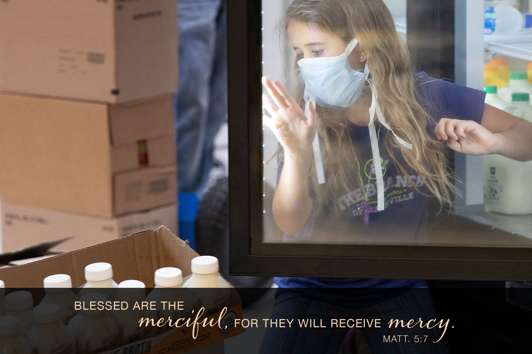 Volunteer Trinley Gibson, 9, loads perishable items into a cooler at the Branch of Antioch emergency food assistance program at Antioch (Tenn.) United Methodist Church. The program received a "Sheltering in Love," grant from the United Methodist Committee on Relief to assist vulnerable communities in the United States and around the world during the COVID-19 pandemic. Photo by Mike DuBose, UM News.