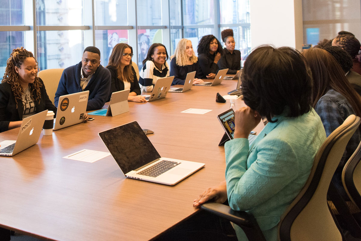 Stock image of a meeting by Christina @ wocintechchat.com on Unsplash.