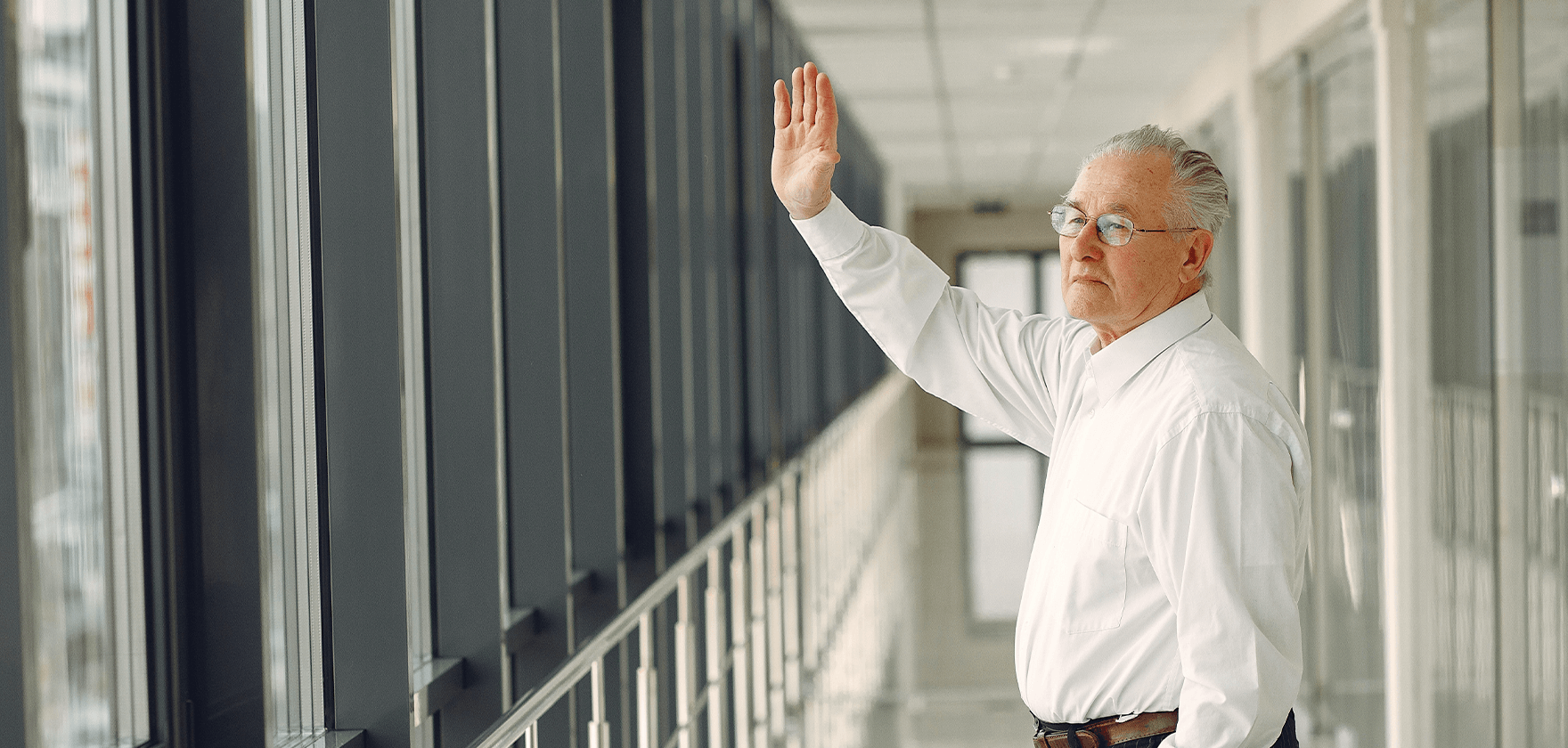 Person waving good-bye. Photo by Gustavo Fring