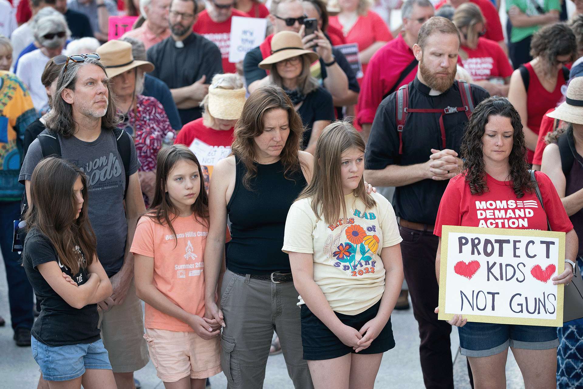 Supporters of gun reform join in prayer outside the Tennessee State Capitol in Nashville as lawmakers begin a special legislative session focused on public safety following a mass shooting at the Covenant School here in March. Joining the prayer is the Rev. Eric Mayle (second from right) of Calvary United Methodist Church in Nashville. Photo by Mike DuBose, UM News.