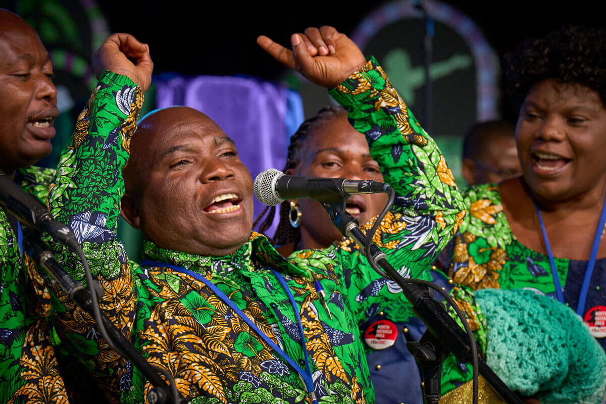 The Rev. John Kabwit of the North Katanga Conference leads a choir of delegates from Congo in singing during morning worship on April 29 at the 2024 United Methodist General Conference in Charlotte, N.C. Photo by Paul Jeffrey/UM News.
