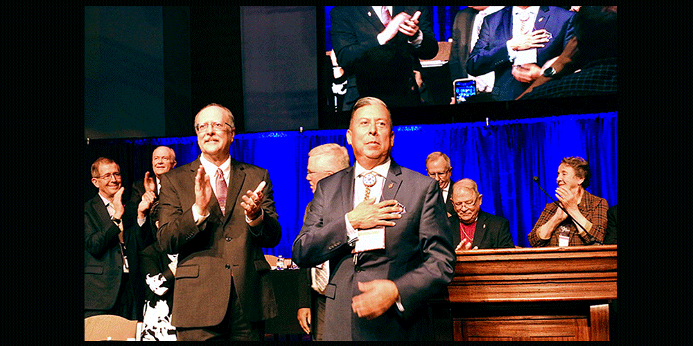 The Rev. David Wilson, the first Native American United Methodist bishop, accepts congratulations after his election to the episcopacy at the South Central Jurisdictional Conference Nov. 2, in Houston. Photo by Sam Hodges, UM News.